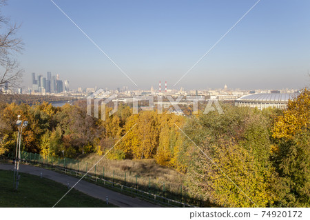view of central Moscow from Sparrow Hills or Vorobyovy Gory observation (viewing) platform-- is on a steep bank 85 m above the Moskva river, or 200 m above sea level. Moscow, Russia 74920172