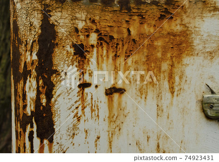 Rusty painted metal background with rust stains. Abstract background with cracked paint for your vintage grunge design Rusty painted metal background with rust stains. Abstract background with cracked paint for your vintage grunge design 74923431
