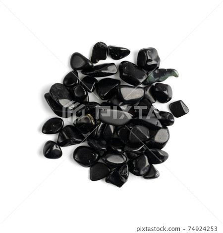 Black onyx pebbles isolated, polished hematite gem stones 74924253