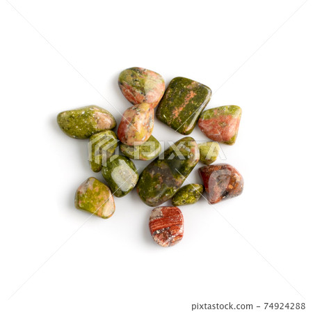 Unakite pebbles isolated, pink and green altered granite stones Unakite pebbles isolated, pink and green altered granite stones 74924288