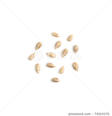 Pile sunflower seeds isolated on white background top view Pile sunflower seeds isolated on white background top view 74924370