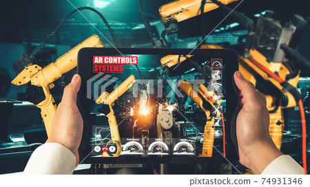 Engineer controls robotic arms by augmented reality industry technology Engineer controls robotic arms by augmented reality industry technology 74931346