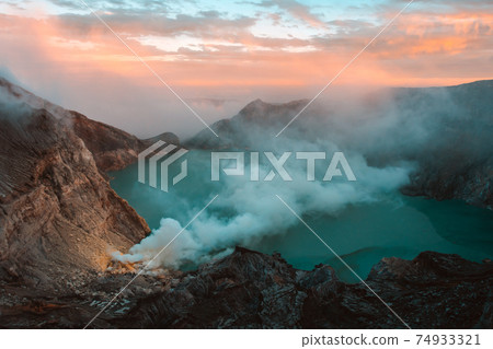 Lake and Sulfur Mine at Khawa Ijen Volcano Crater, Java Island, Indonesia Lake and Sulfur Mine at Khawa Ijen Volcano Crater, Java Island, Indonesia 74933321