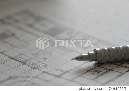 House drawing (blueprint) and mechanical pencil for drafting 74936515