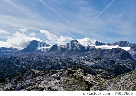 Dachstein Mountains seen from the top of Krippenstein Dachstein Mountains seen from the top of Krippenstein 74937669