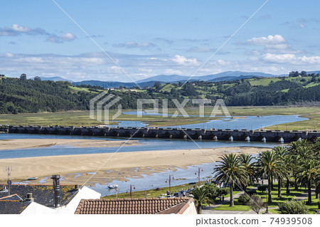 Maza bridge over the estuary of San Vicente de la Barquera, Cantabria, Spain. Maza bridge over the estuary of San Vicente de la Barquera, Cantabria, Spain. 74939508