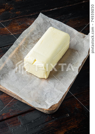 Rustic farmhouse inspired butter, on old dark wooden table background Rustic farmhouse inspired butter, on old dark wooden table background 74939850