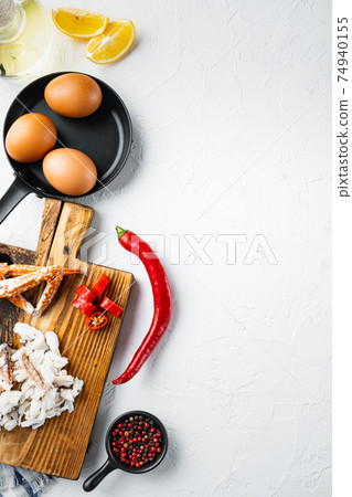 Omelette ingredients with pepper, crab meat, egg, cheese, on white background, top view flat lay , with copyspace and space for text Omelette ingredients with pepper, crab meat, egg, cheese, on white background, top view flat lay , with copyspace and space for text 74940155