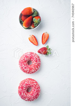 Strawberry Donuts, on white background, top view flat lay Strawberry Donuts, on white background, top view flat lay 74940967