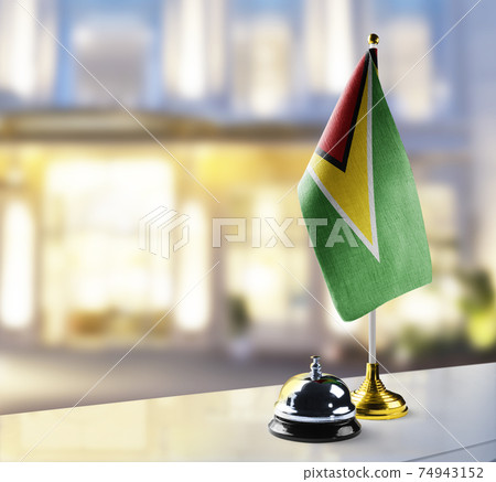 Guyana flag on the reception desk in the lobby of the hotel Guyana flag on the reception desk in the lobby of the hotel 74943152
