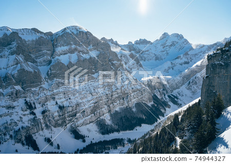 beautiful sunny snowy mountain landscape on Ebenalp in Appenzell 74944327