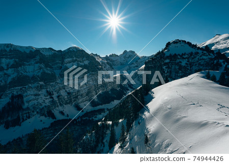 beautiful sunny snowy mountain landscape on Ebenalp in Appenzell 74944426