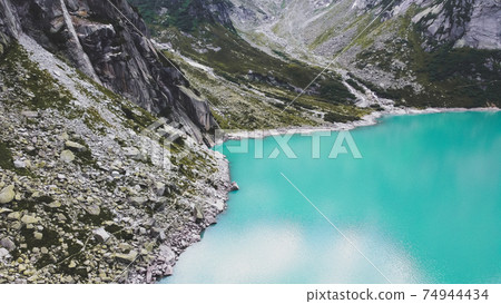 Beautiful mountain lake Gelmersee in Bern Switzerland Beautiful mountain lake Gelmersee in Bern Switzerland 74944434