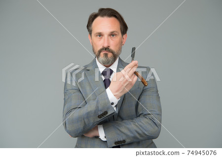 Barbershop interested in your hair. Boss hold razor blade. Barbershop interested in your hair. Boss hold razor blade. 74945076