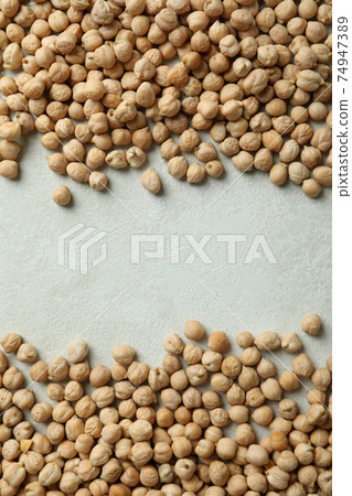 Fresh chickpea on white textured background, space for text 74947389