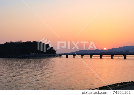 Sunset over a bridge over Takeshima, Gamagori City, Aichi Prefecture 74951101