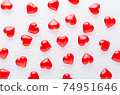 white background with red hearts pattern and water drops, flat lay 74951646
