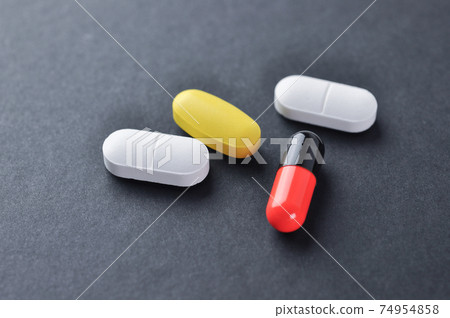 Pills and capsule. 74954858