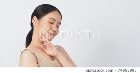 Beauty and skin concept. Young asian woman beauty face make up for skincare cosmetic and showing natural wellness soft and firm and ageless facial skin. younger-looking youthful. real acne no retouch Beauty and skin concept. Young asian woman beauty face make up for skincare cosmetic and showing natural wellness soft and firm and ageless facial skin. younger-looking youthful. real acne no retouch 74955993