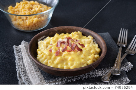 Bowl of macaroni and cheese 74956294