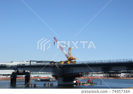 I saw a new bridge construction site at the mouth of the Rokugo River on a sunny day 74957384