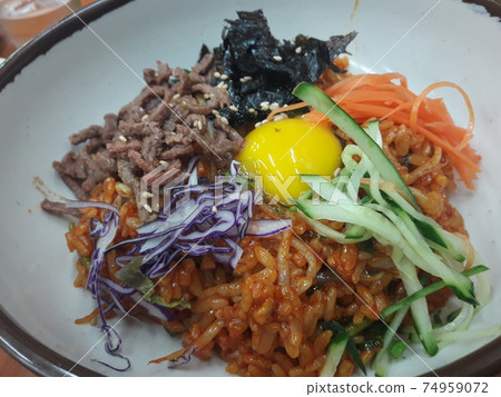 Korean traditional cuisine Fresh and generous Korean beef yukhoe bibimbap Korean traditional cuisine Fresh and generous Korean beef yukhoe bibimbap 74959072
