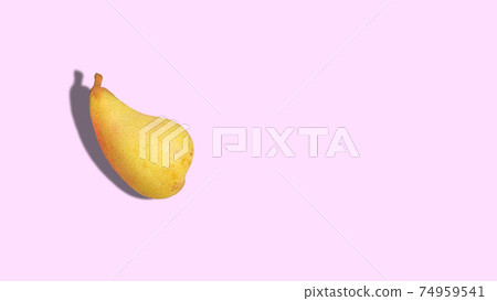 Ripe pear on a pink background with copy space. Ripe pear on a pink background with copy space. 74959541
