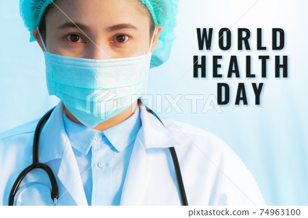 World Health Day concept, Coronavirus stop infection. female doctor wearing mask with stethoscope World Health Day concept, Coronavirus stop infection. female doctor wearing mask with stethoscope 74963100