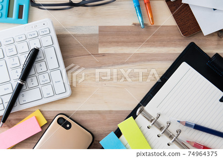 Office supplies bird's-eye view wood grain background shooting material 74964375