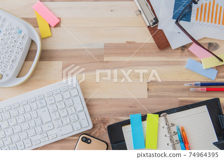 Office supplies bird's-eye view wood grain background shooting material 74964395