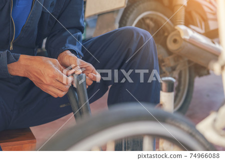 Mechanic car service auto garage in automotive mobile center. Technician workshop repair engine Mechanic car service auto garage in automotive mobile center. Technician workshop repair engine 74966088