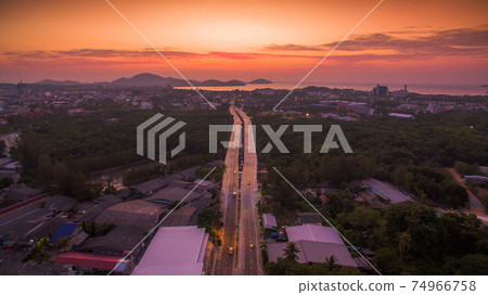 The sun rises over Thepsrisin Bridge. Thepsrisin Bridge is a shortcut to connect the city from Saphan Hin intersection with Sakdidet intersection in order to reduce the bad traffic congestion. The sun rises over Thepsrisin Bridge. Thepsrisin Bridge is a shortcut to connect the city from Saphan Hin intersection with Sakdidet intersection in order to reduce the bad traffic congestion. 74966758