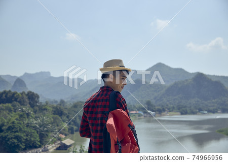 men look out over the mountains and rivers 74966956