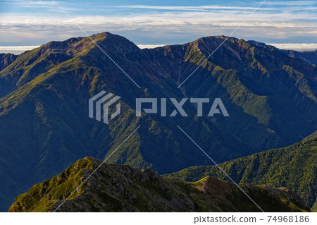 Mt. Arakawa in the morning seen from Mt. Shiomi in the Southern Alps Mt. Arakawa in the morning seen from Mt. Shiomi in the Southern Alps 74968186