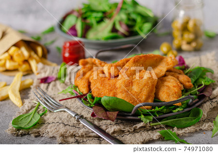 Chicken chnitzel breaded Chicken chnitzel breaded 74971080