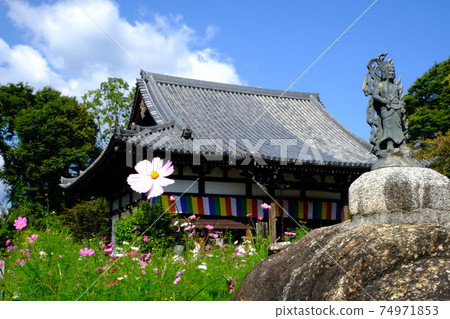 Hannyaji Temple in the ancient city of Nara, a statue of Fudo Myo enshrined in Kanman stone Hannyaji Temple in the ancient city of Nara, a statue of Fudo Myo enshrined in Kanman stone 74971853