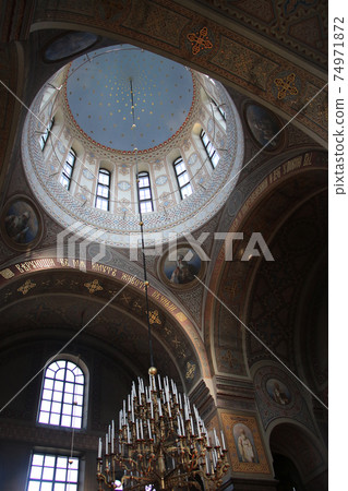 Uspensky Cathedral standing in Tayanokka Inside the dome with candles 74971872
