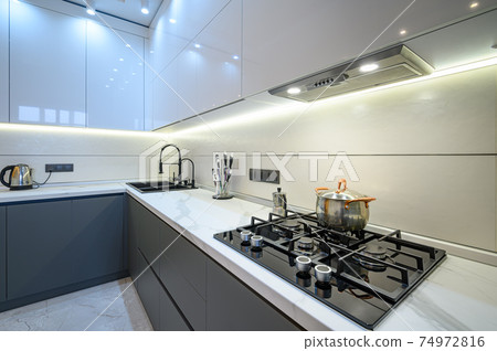 Closeup to luxury gray modern kitchen interior 74972816