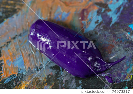 Artistic oil paints on palette close up Artistic oil paints on palette close up 74973217