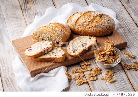 Side view on sliced muesli cereal bread 74973559