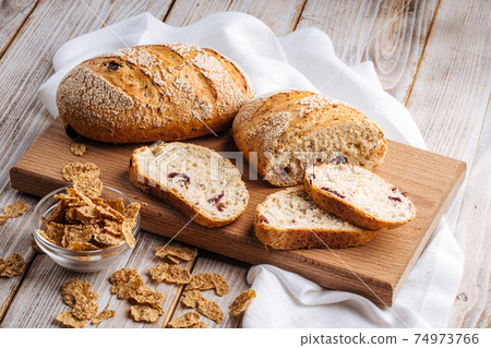 Side view on sliced muesli cereal bread 74973766