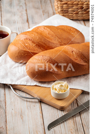 White loaf breads with butter and coffee 74974001