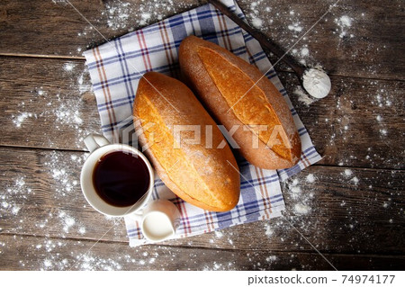 Top view on loafs of yeast-free bread with coffee 74974177