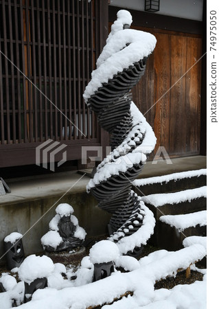 Objects made of roof tiles and snow Objects made of roof tiles and snow 74975050