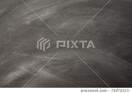Chalk rubbed out on blackboard, chalkboard texture background copy space for add text and design Chalk rubbed out on blackboard, chalkboard texture background copy space for add text and design 74978323