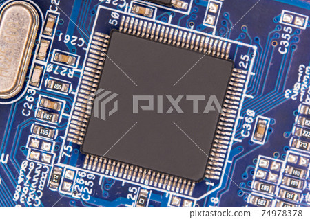 Close up blank microchip on Electronic circuit board. 74978378