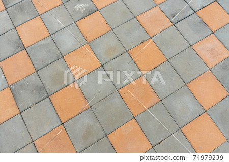 Dirty Paving block. Street cement block floor background Dirty Paving block. Street cement block floor background 74979239
