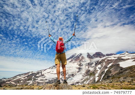 Hike in mountains Hike in mountains 74979777