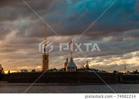 Russia. July 5, 2015. Peter and Paul Fortress, located on Zayachy Island in St. Petersburg in the evening sun. 74982214