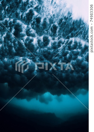 Wave with foam underwater. Transparent ocean in underwater Wave with foam underwater. Transparent ocean in underwater 74983306